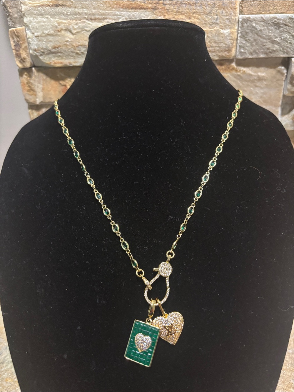 Gold-Tone Necklace with Green Crystal Heart Charm and a LV Crystal Heart Pendant